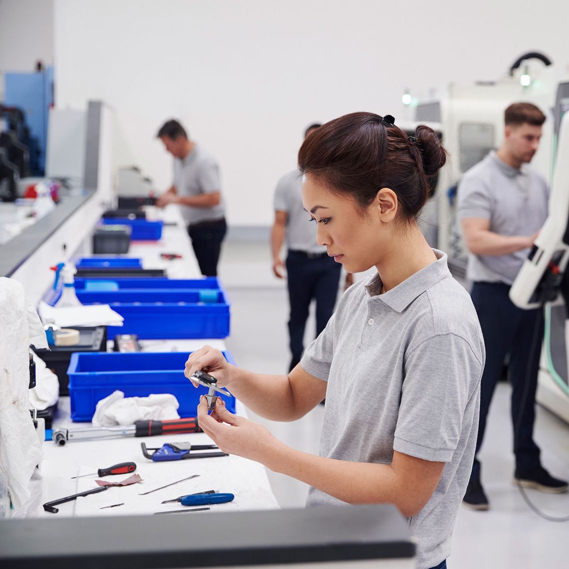 Quality control employee at station